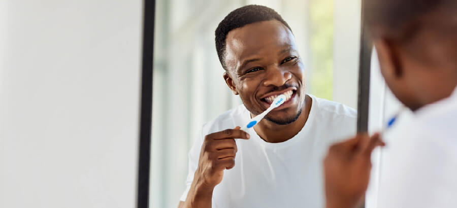 Veja as principais causas e saiba como evitar o desgaste dentário